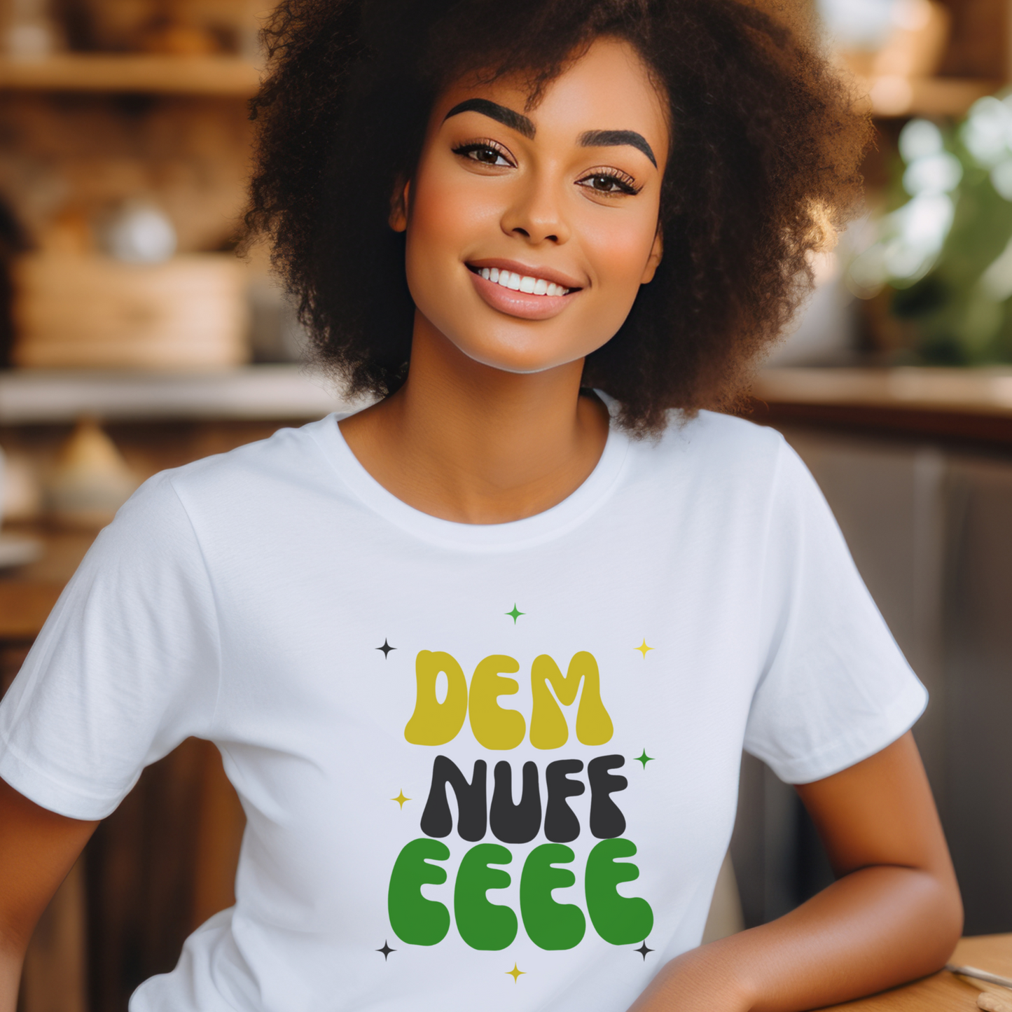Woman wearing a white t-shirt with colorful text in a casual setting "dem nuff eeee"