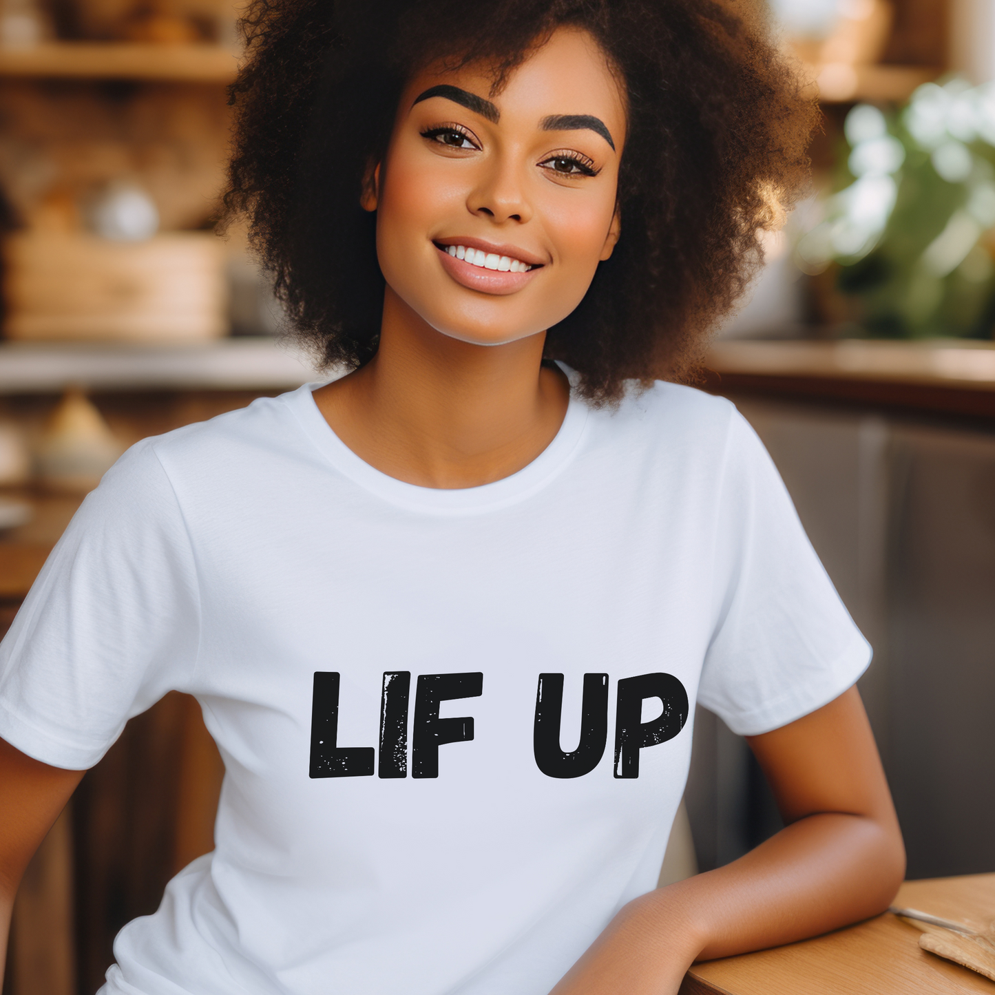 Woman wearing a white t-shirt with 'LIF UP' text in a casual setting