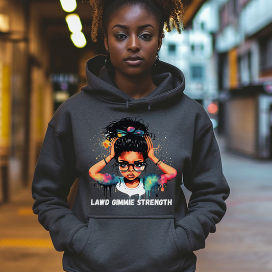 Person wearing a hoodie with a graphic design and text in an urban setting